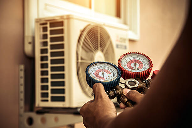Professional Hvac technician working in Estero, FL